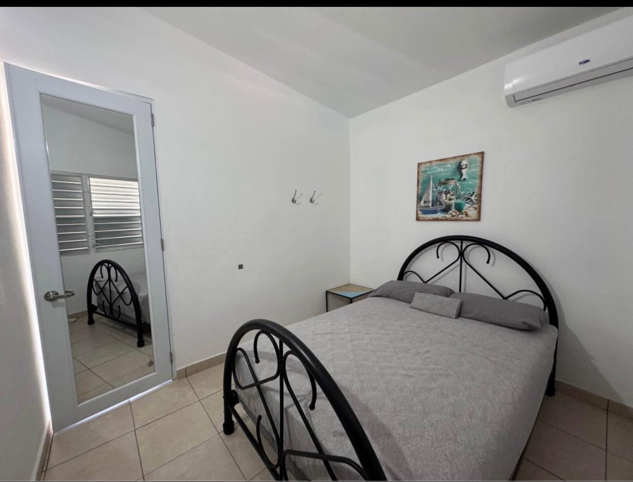 Habitación con cama queen